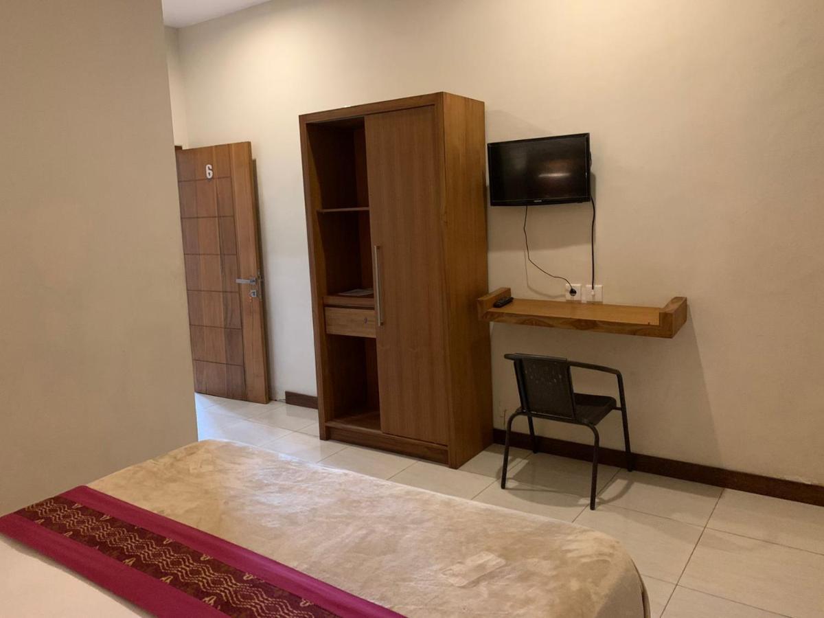 Kuta Suci Guesthouse Dış mekan fotoğraf