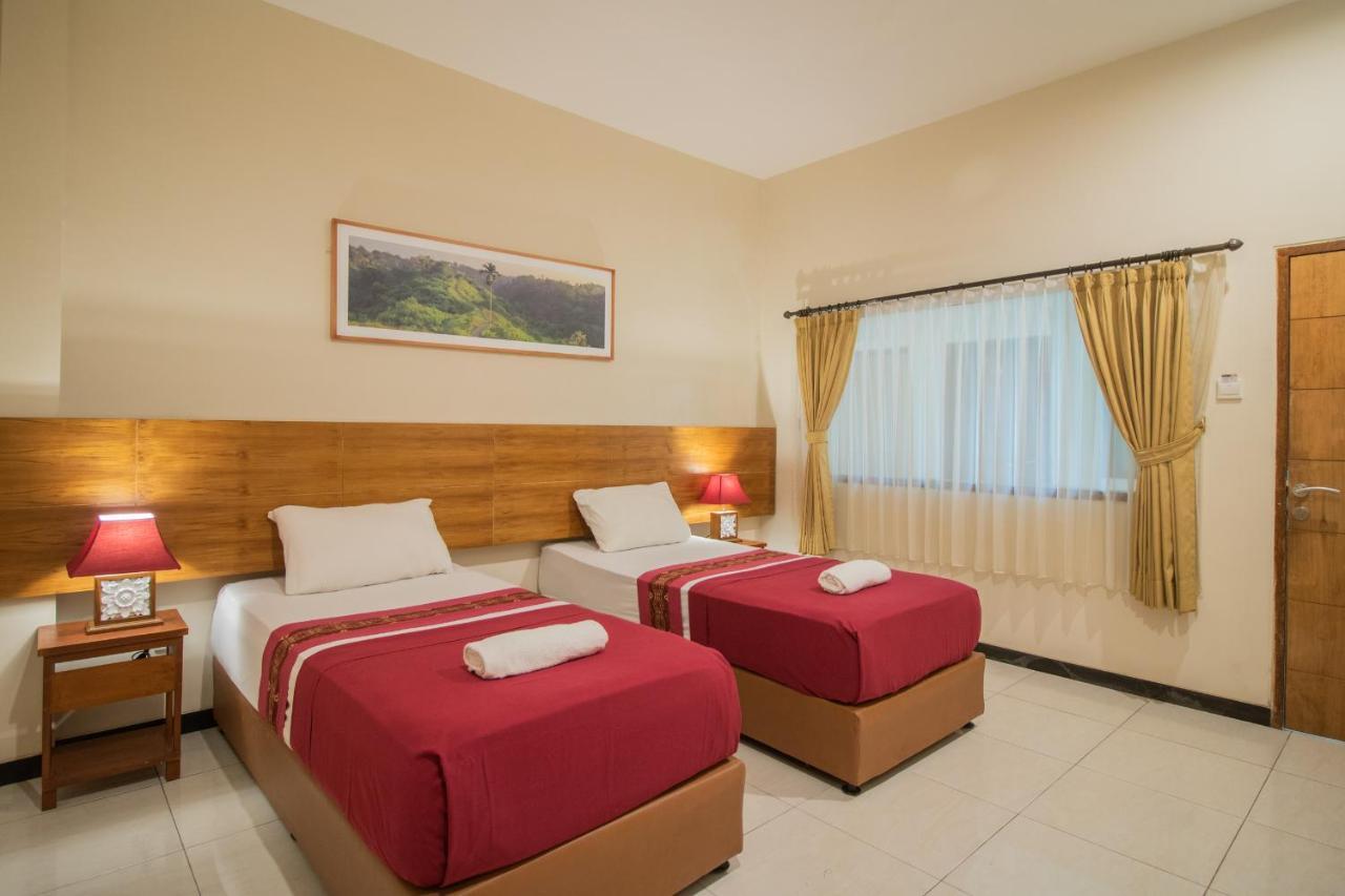 Kuta Suci Guesthouse Dış mekan fotoğraf