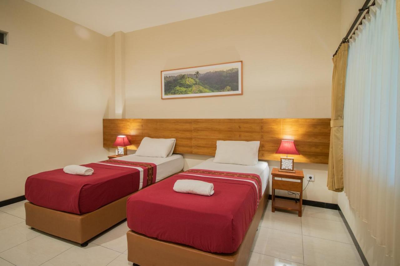 Kuta Suci Guesthouse Dış mekan fotoğraf