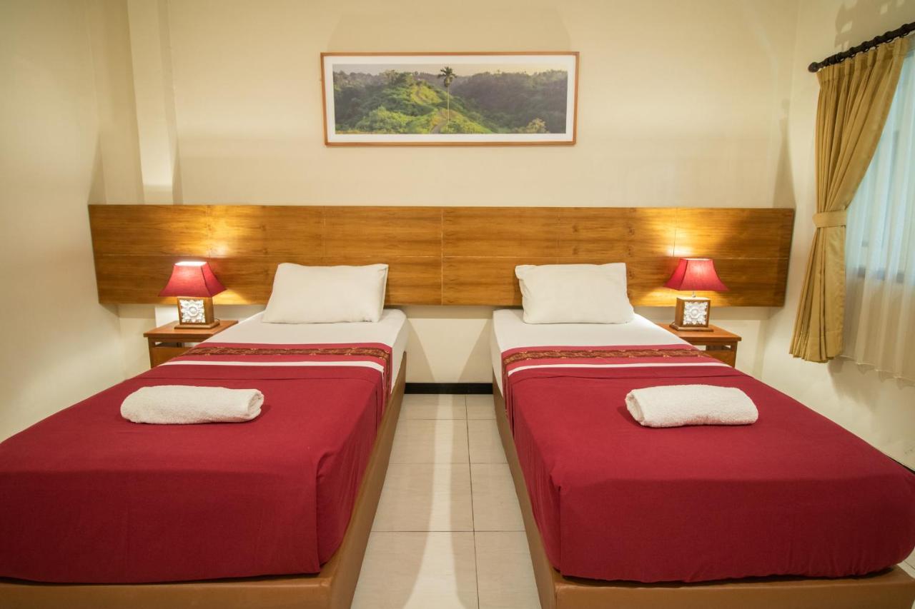 Kuta Suci Guesthouse Dış mekan fotoğraf