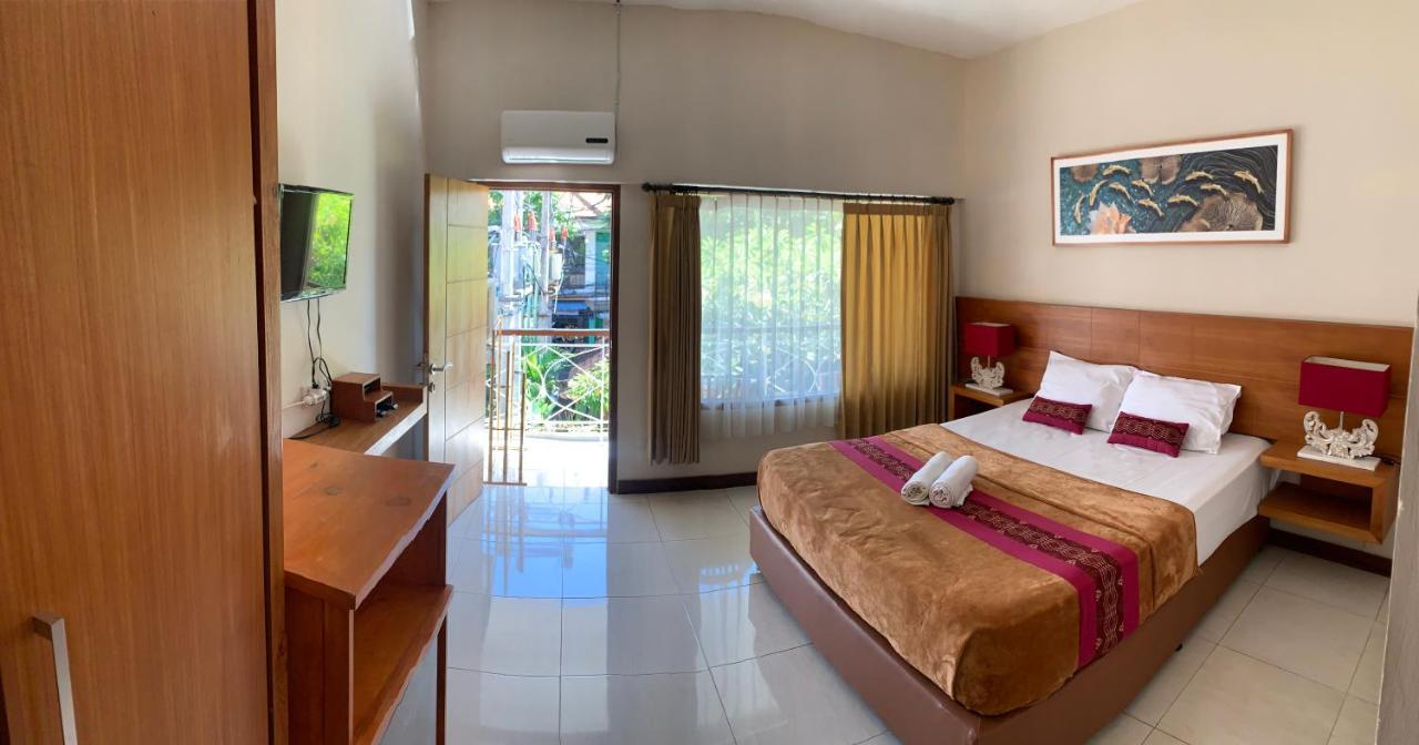 Kuta Suci Guesthouse Dış mekan fotoğraf