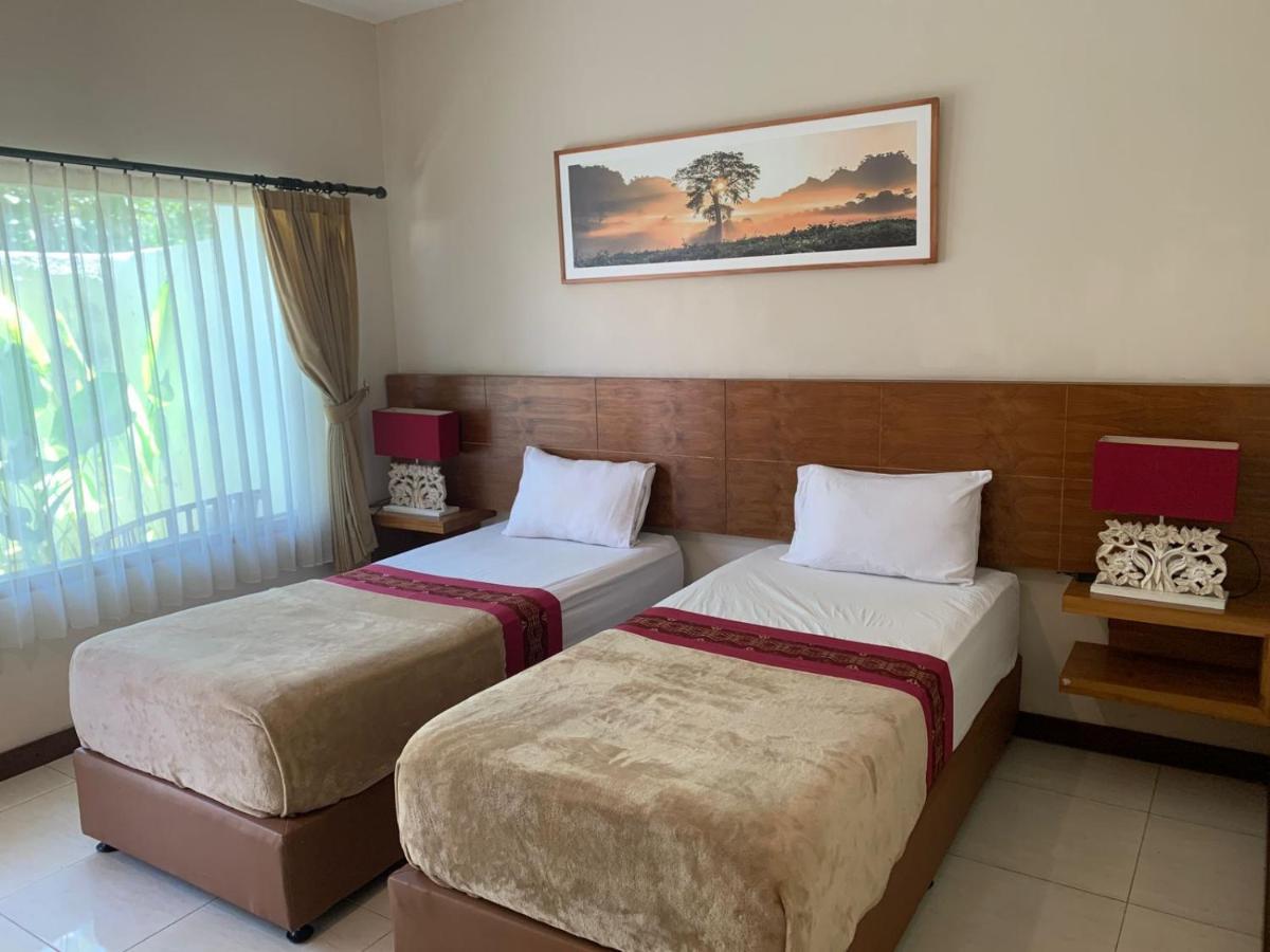 Kuta Suci Guesthouse Dış mekan fotoğraf