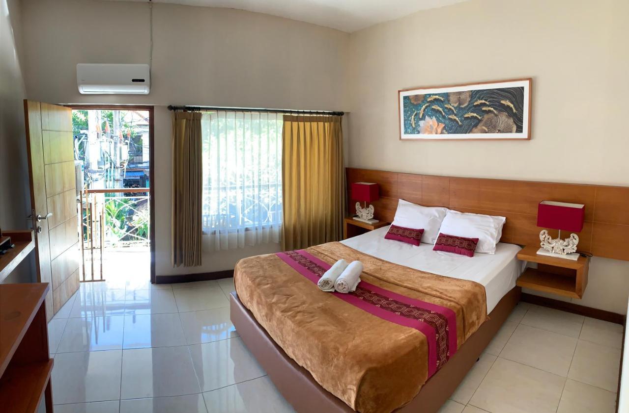 Kuta Suci Guesthouse Dış mekan fotoğraf