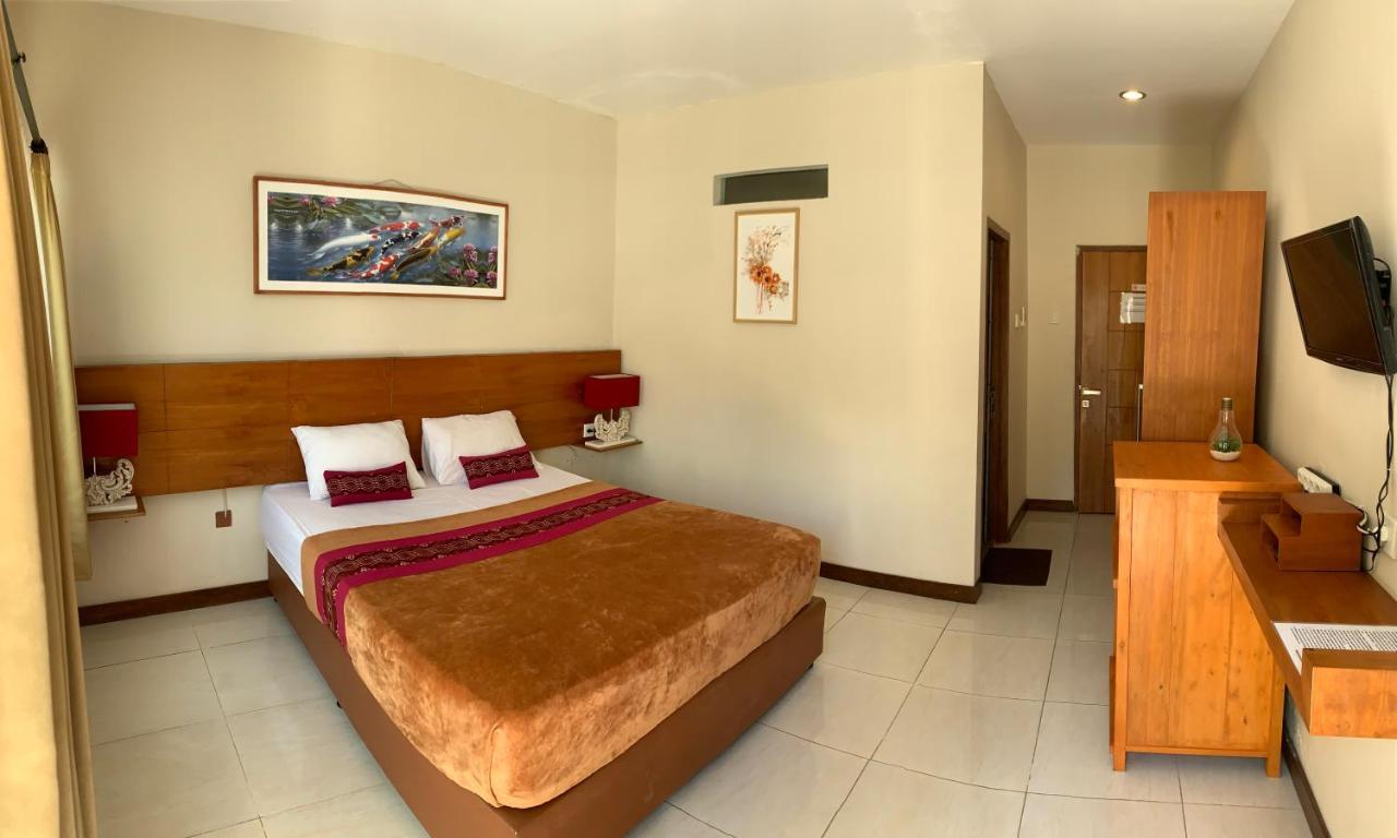 Kuta Suci Guesthouse Dış mekan fotoğraf