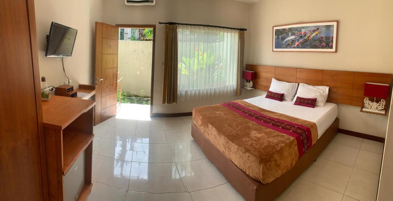 Kuta Suci Guesthouse Dış mekan fotoğraf