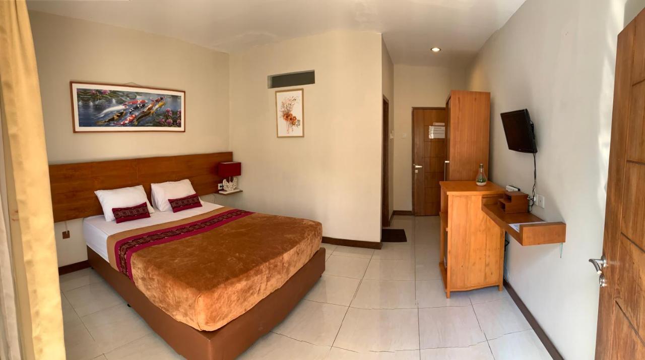 Kuta Suci Guesthouse Dış mekan fotoğraf
