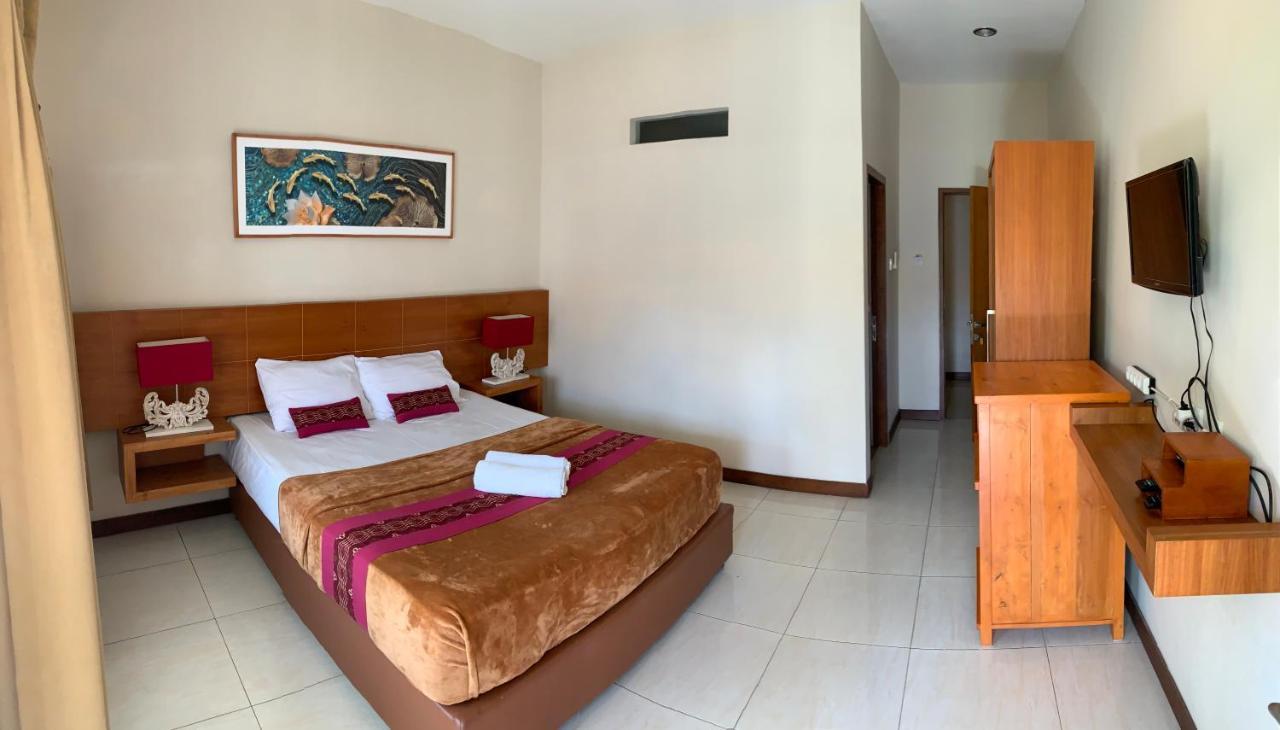 Kuta Suci Guesthouse Dış mekan fotoğraf