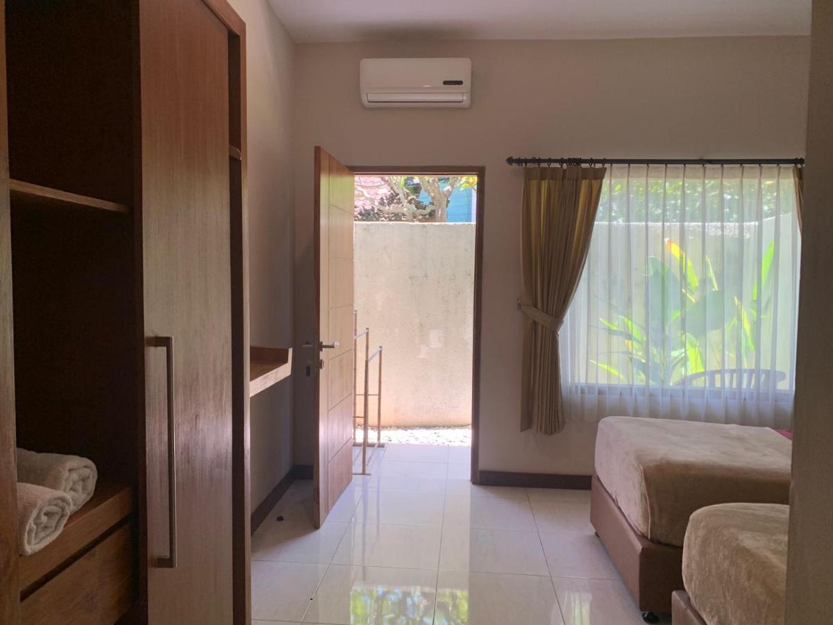 Kuta Suci Guesthouse Dış mekan fotoğraf