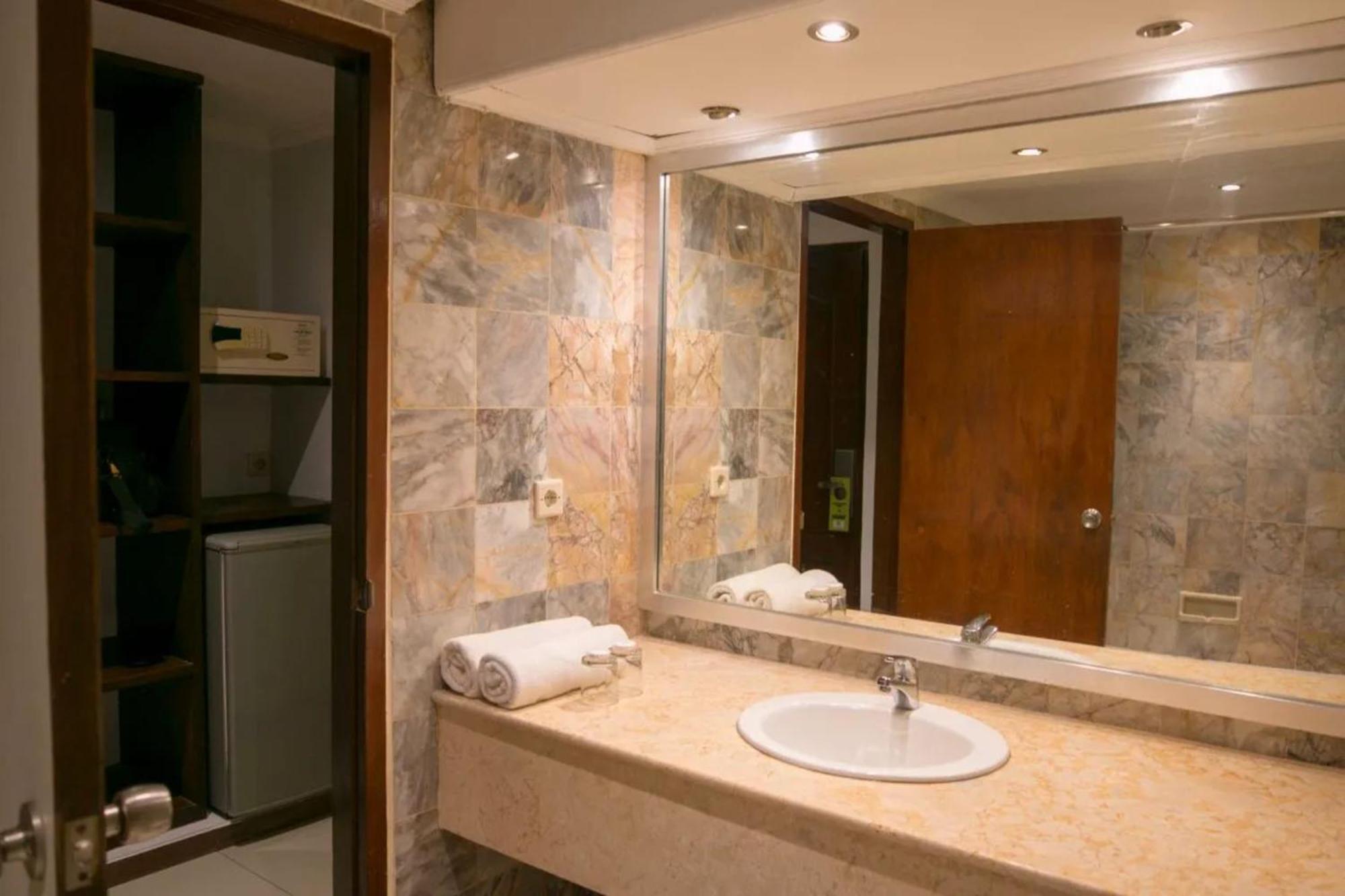 Kuta Suci Guesthouse Dış mekan fotoğraf